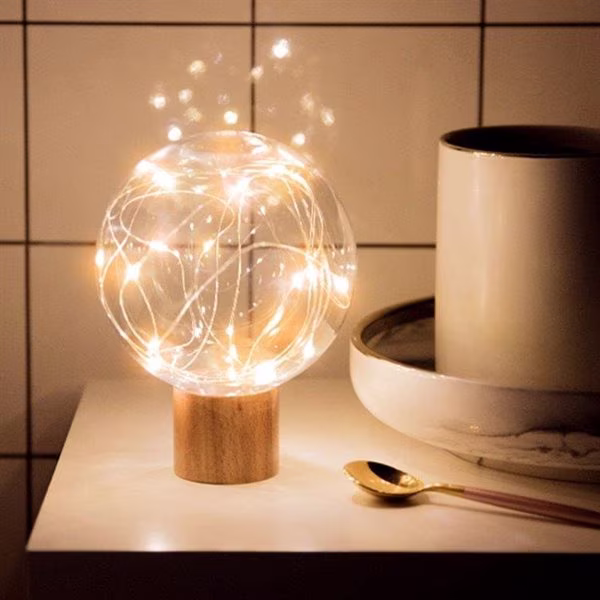 LED-lampa med stjärnhimmel